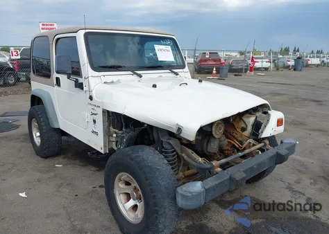 1999 Jeep Wrangler Sport z USA, uszkodzony, nr VIN 1J4FY19S4XP496901